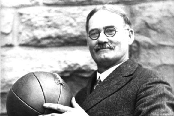 old photo of james naismith with basket ball