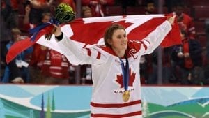picture of Hayley Wickenheiser with canadian flag