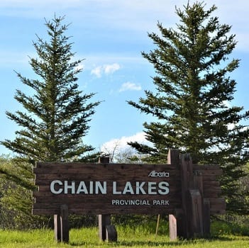 wood made sign board of chain lake park