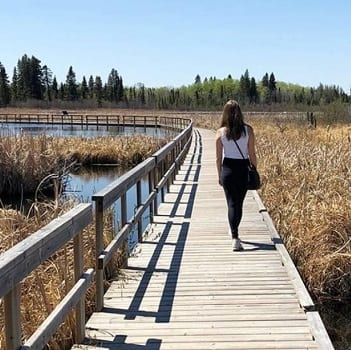 girl walking on trail