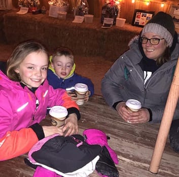 a family drinking coffee in winters