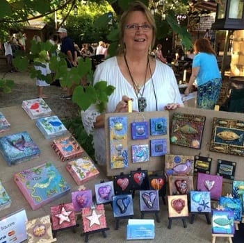 A Woman in art by the market