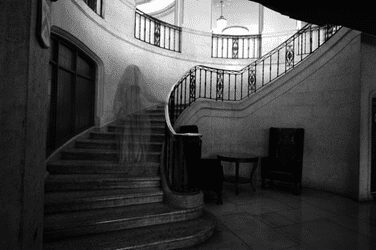 black and white picture of ghost bride on stairs